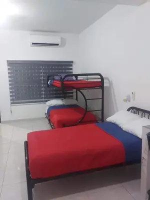 Cama o camas de una habitación en DEPARTAMENTO PERLITA