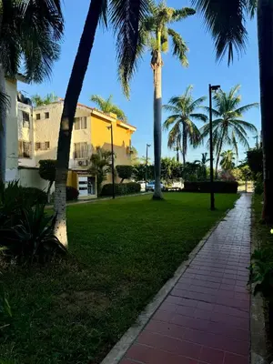 Jardín al aire libre en Acogedor departamento cerca de la playa