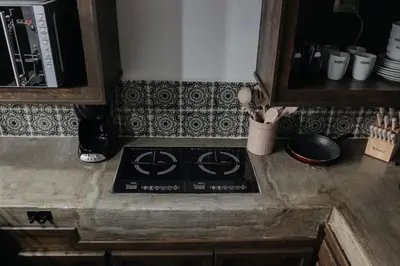 Una cocina o zona de cocina en Departamentos Madero