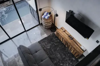 Una televisión o centro de entretenimiento en Departamentos Madero