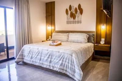 Cama o camas de una habitación en Marina Cerritos Loft Wave Pool and Amenities