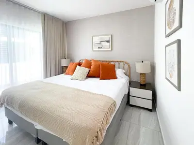 Cama o camas de una habitación en Charming apartment 3 minutes from the beach