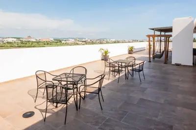 Un balcón o terraza de Loft para 4 personas con alberca
