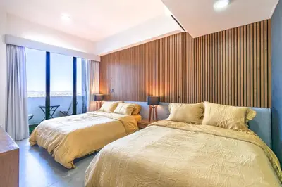 Cama o camas de una habitación en Vista Espectacular en Depa Sobre Malecon