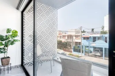 Un balcón o terraza de Condo en el Corazón del Turismo muy Cerca de la Playa