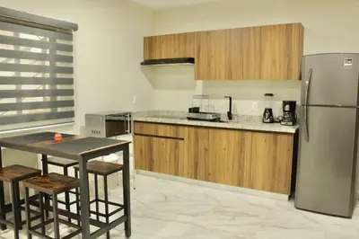 Una cocina o zona de cocina en Hotel boutique 1A Lomas Sense