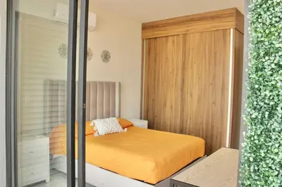 Cama o camas de una habitación en Hotel boutique 1A Lomas Sense