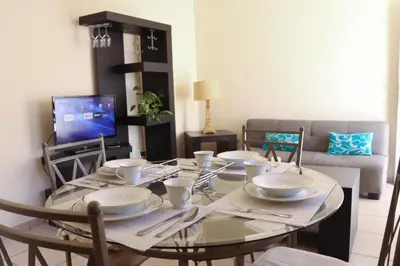 Una televisión o centro de entretenimiento en Depa en Centenario Exelente Ubicación 1!