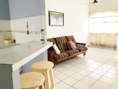 Zona de estar de Olímpica - Departamento Arcoíris - 5 Min Malecón