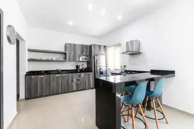 Una cocina o zona de cocina en Elegante depa super céntrico en zona dorada