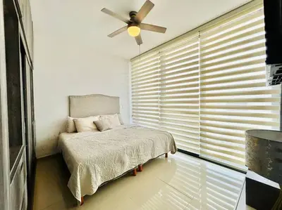 Cama o camas de una habitación en Elegante depa super céntrico en zona dorada 1