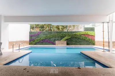 Piscina en o cerca de Elegante depa super céntrico en zona dorada 1