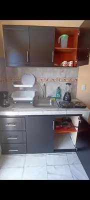 Una cocina o zona de cocina en Habitación principal en Mazatlán