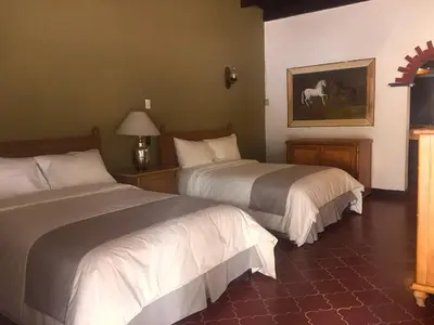 Cama o camas de una habitación en Parador del Alma