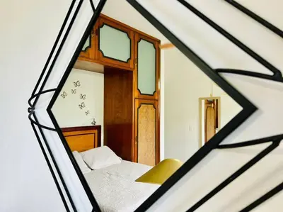 Cama o camas de una habitación en en centro cerca de la playa y machado by G P S rentas