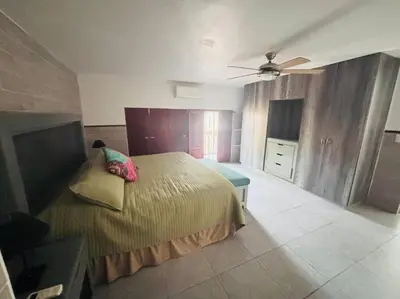 Cama o camas de una habitación en Departamento en centro de Mazatlán para parejas 6