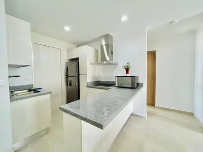 Una cocina o zona de cocina en cómodo con alberca cerca de la playa by G P S rentas