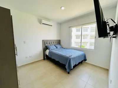 Cama o camas de una habitación en cómodo con alberca cerca de la playa by G P S rentas
