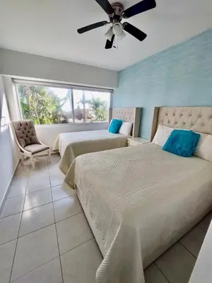 Cama o camas de una habitación en FRENTE AL MAR A PIE DE PLAYA ALBERCA y JACUZZI