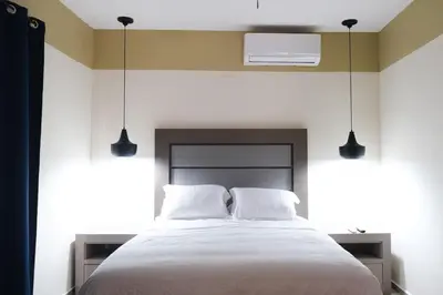 Cama o camas de una habitación en Enjoy Waves History and Comfort 2BR - 6 Guests