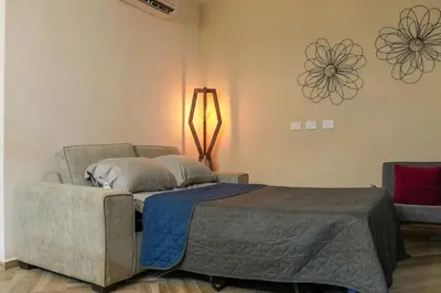 Zona de estar de King Bed Retreat Parking Ideal Workspace