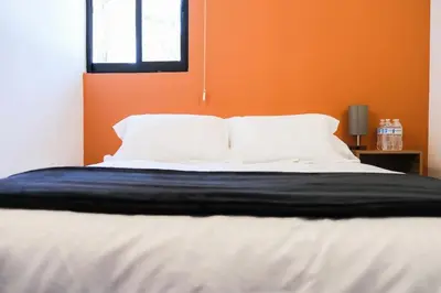 Cama o camas de una habitación en Walkable Vacation Gem 2BR1BA Office