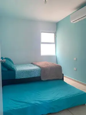 Cama o camas de una habitación en Depa playa esmeralda