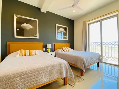 Cama o camas de una habitación en Gavias Grand Cerritos