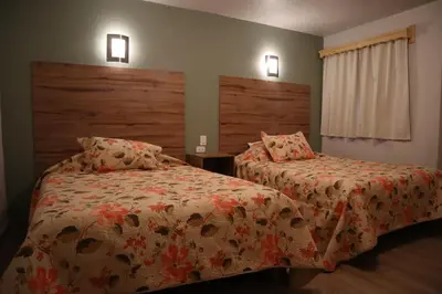 Cama o camas de una habitación en La Casona de los Abuelos