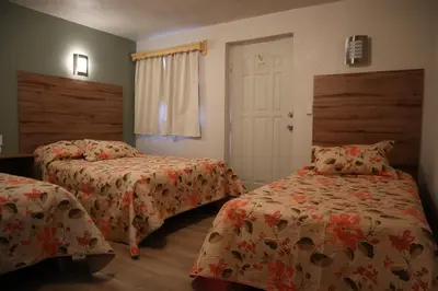 Cama o camas de una habitación en La Casona de los Abuelos