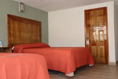Cama o camas de una habitación en La Casona de los Abuelos