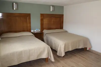 Cama o camas de una habitación en La Casona de los Abuelos