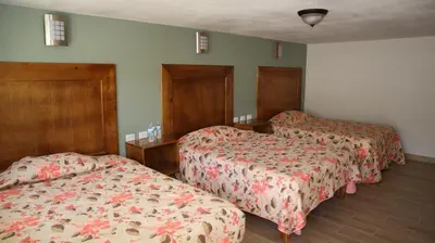 Cama o camas de una habitación en La Casona de los Abuelos