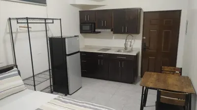 Una cocina o zona de cocina en Estudios OM
