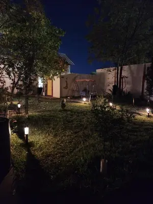 Jardín al aire libre en Encantadora Cabaña de Campo con Alberca Privada