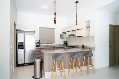 Una cocina o zona de cocina en Departamento Con Alberca