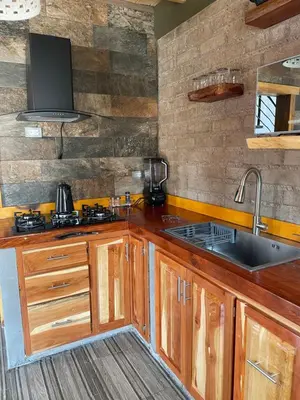 Una cocina o zona de cocina en Cabañas El Potrero