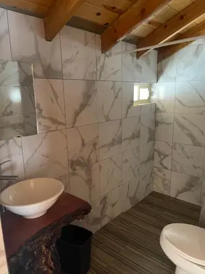 Un baño de Cabañas El Potrero