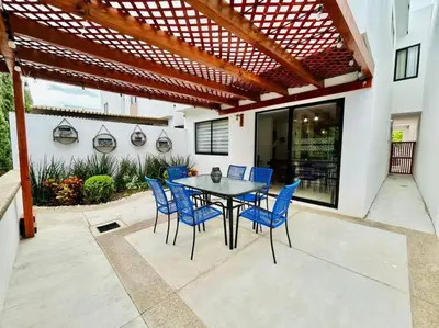 Un patio o zona al aire libre en Casa en privada cerca de la playa y la Marina