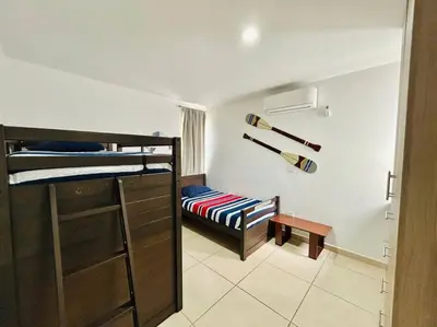 Cama o camas de una habitación en Casa en privada cerca de la playa y la Marina