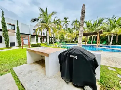Piscina en o cerca de Casa en privada cerca de la playa y la Marina