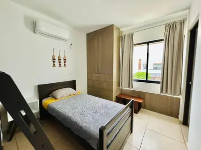 Cama o camas de una habitación en Casa en privada cerca de la playa y la Marina