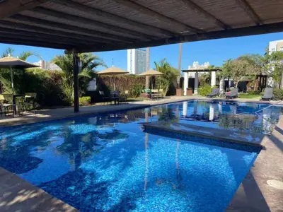 Piscina en o cerca de Departamento cerca del mar y con vista
