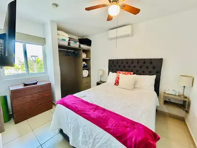 Cama o camas de una habitación en Departamento cerca del mar y con vista