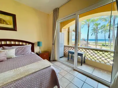 Cama o camas de una habitación en Departamento cerca del mar y con vista