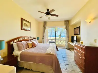 Cama o camas de una habitación en Departamento cerca del mar y con vista