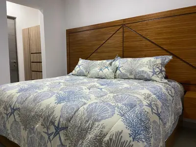 Cama o camas de una habitación en Vacacional Bluú Hábitat Lagoons