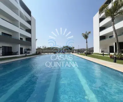 Piscina en o cerca de Cómodo departamento vacacional con amenidades