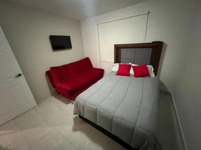 Cama o camas de una habitación en Alojamiento residencial, cerca de TSM