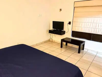 Una televisión o centro de entretenimiento en Departamento Gaviotas